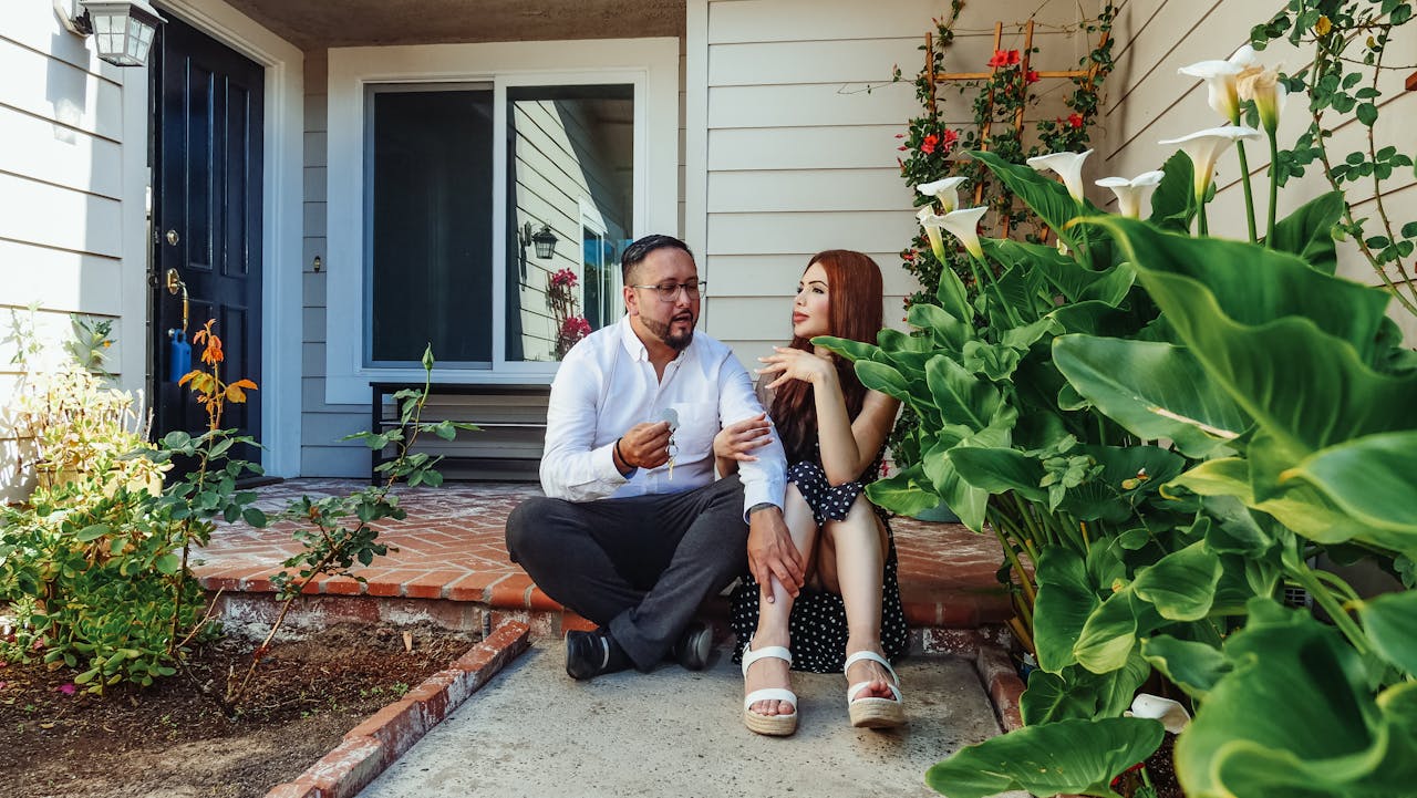 Sacramento home with a for sale sign. Image by Pexels